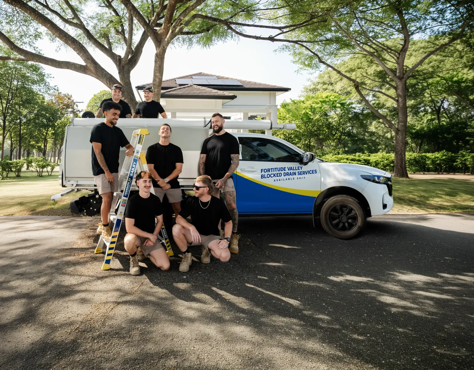 Fortitude Valley Blocked Drain Services ute and team